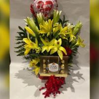 Special Floral Arrangement With 10 Lilis Yellow. · Beautiful flower arrangement in a  Lilis yellow and BOX CHOCOLATE × 12