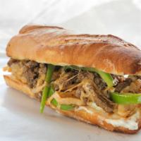 Mushroom Philly Cheesesteak · Tender steak, mushrooms, melted gooey cheese, and onions hugged by a toasted butter roll.