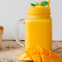 Tropical Start Juice · Fresh mangos with orange juice.