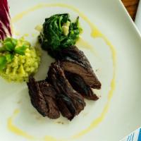 Wood Fire Hanger Steak · basil mashed potatoes, wilted spinach, chimichurri sauce