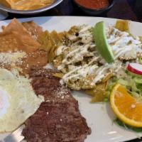 Chilaquiles · Fried nachos in a green sauce topped with your choice of meat,beef or chiken lettuce, tomato...