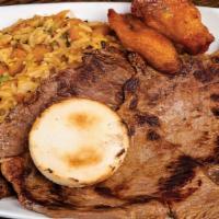 Carne Asada Con Calentado · Grilled steak and refried beans.