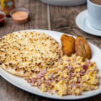 Arepa Con Queso & Huevos Con Jamon · Scrambled egg with ham & arepa with melted cheese.
