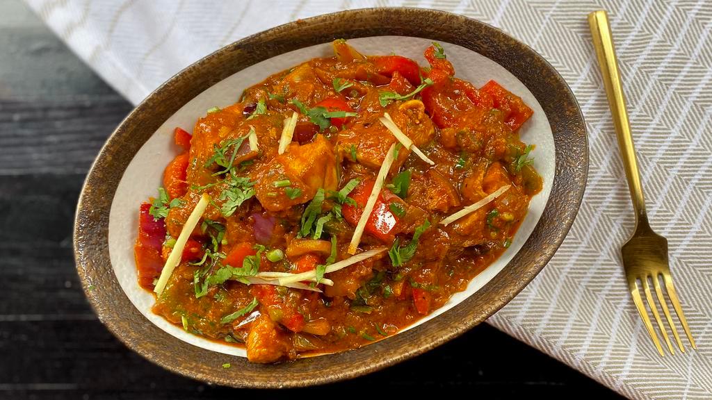 Chicken Kadhai Masala · Spicy. Chicken simmered in an onion tomato gravy.