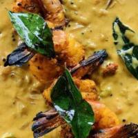 Allepy Fish Curry
 · fish of the day simmered in coconut extract w/ curry leaves green chilies, lime juice