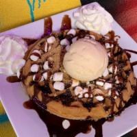 S'Mores Waffle · A campfire-inspired waffle covered in chocolate chips, graham cracker crumbs, mini marshmall...