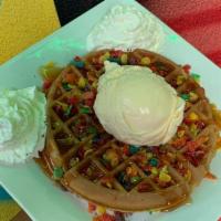 Fruity Pebbles Waffle · Yabba Dabba Doo!  A waffle topped with Fruity Pebbles® cereal and a caramel drizzle.  Comes ...