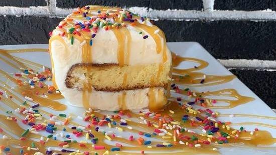 Pure Vanilla Ice Cream Cake · There’s nothing plain about this cake. Enjoy a combination of vanilla cake & vanilla ice cream,
