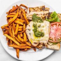 Grilled Chicken Sandwich · Served with swiss cheese, lettuce, tomato and pesto sauce. Served with pickle, lettuce, toma...