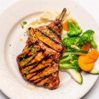 Pork Chops · Served with homemade apple sauce. Served with choice of two sides.