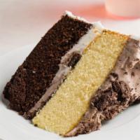 Cookies & Cream · One Layer Chocolate Cake & One Layer of Yellow 
Buttercake
With
Cookies & Cream Frosting & F...