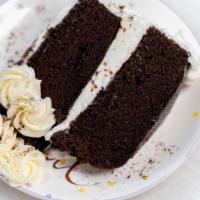 Chocolate Cream · Chocolate Cake 
With 
Buttercream Frosting & Filling