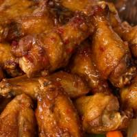 Chicken Wings · Gluten-free. Buffalo sauce | Thai chili | or honey BBQ.