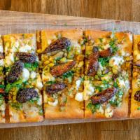 Fig Flatbread · Pistachio | goat cheese | Turkish figs | truffle honey | fresh kale.