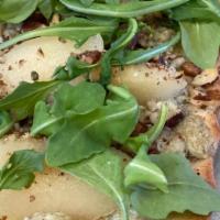 Poached Pear And Blue Cheese · Arugula | blue cheese | poached pear | pecans.