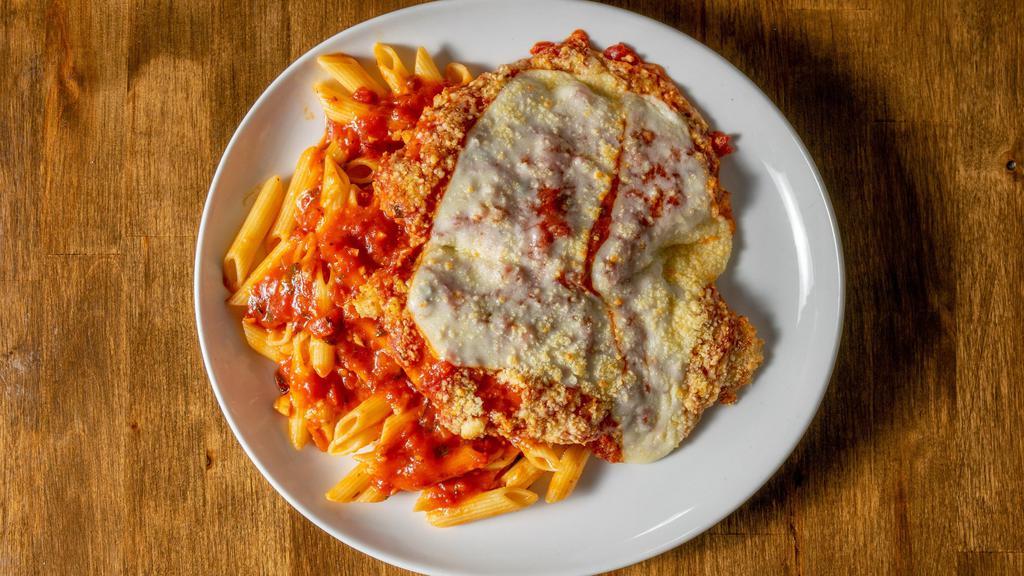 Chicken Parmesan (Organic Free Range) · Breast of chicken | panko | tomato | parmesan cheese | over pasta.