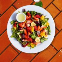 Spinach Berry Salad · Baby spinach, strawberries, feta cheese, walnuts, avocado, and red onion tossed with creamy ...