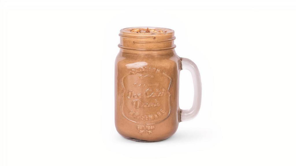 Mocha Mud Smoothie · Avocado, raw cacao, organic maple syrup, coffee ice cubes,  and almond milk.
