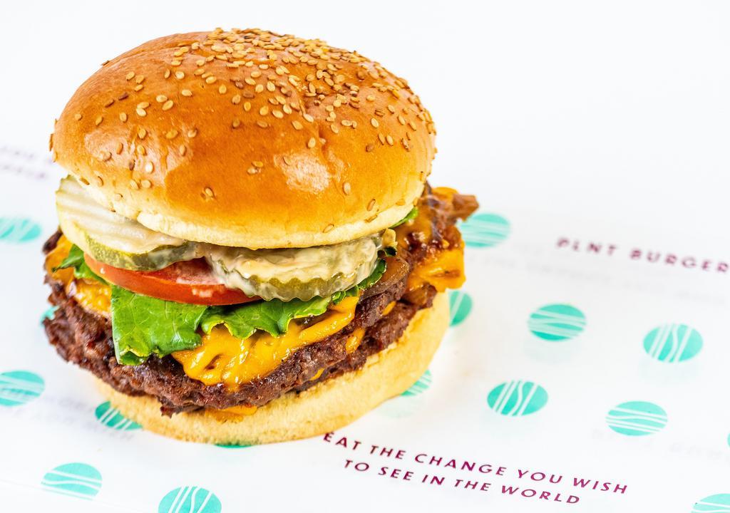 Dbl Plnt Cheeseburger · Double Beyond Meat Patty, Caramelized Onion, Pickles, NewFields American Cheese, Green Leaf Lettuce, Roma Tomato, PLNT Sauce, Sesame Seeded Bun