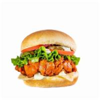 Spicy Chik'N Sandwich · Crispy Gardein Chik'N Tossed in House-Made Hot Sauce, Follow Your Heart Pepper-Jack Slice, G...
