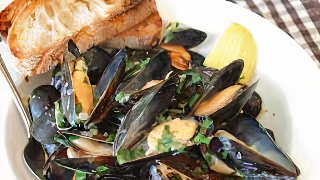 Drunken Mussels Plate · Garlic, shallots, white wine, butter, lemon juice,  and parsley.