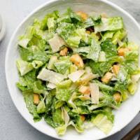 Caesar Salad · Crispy romaine lettuce with fresh croutons, grated Parmesan cheese and creamy Caesar dressing.