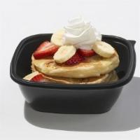 Strawberry Banana · 4 banana pancakes with fresh strawberries, bananas and whipped topping