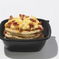 Breakfast Bounty · 4 buttermilk pancakes with scrambled eggs, hickory-smoked bacon pieces, and Jack & Cheddar c...