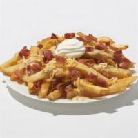 Loaded Fries · French fries topped with hickory-smoked bacon pieces Jack & Cheddar cheese and cheese sauce