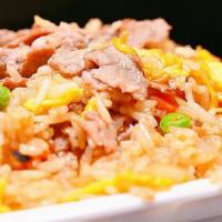 Hibachi House Fried Rice  · Chicken,beef, shrimp, egg, onion pea and carrot,with yum yum sauce