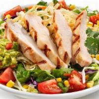 Southwestern Chicken Salad · Grilled chicken served on top of spring sweet greens with Jack cheese, tomatoes, corn, guac,...