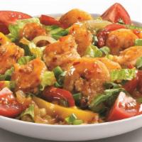 Bangkok Shrimp Bowl · Bangkok Shrimp on a bed of Mexican rice, grilled peppers and onions, and shredded Romaine, g...