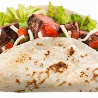 Classic Taco · A warm flour tortilla filled with your choice of protein/meat, Jack cheese, lettuce and salsa.