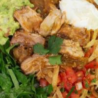 Enchilada Bowl · Choice of grilled mesquite chicken, steak or pork carnitas over rice with Jack cheese, sour ...