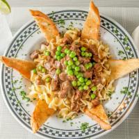 Beef Stroganoff · Eggnoodle pasta, green peas and toasted garlic bread. Served with soup or salad.