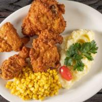 Fried Chicken · 4 pieces of fried chicken, served with mashed potato and corn.