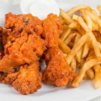 L12 Buffalo Wings W/Fries · Wings served with Grilled Vegetables, french fries, lemon potatoes, or rice, toasted regular...