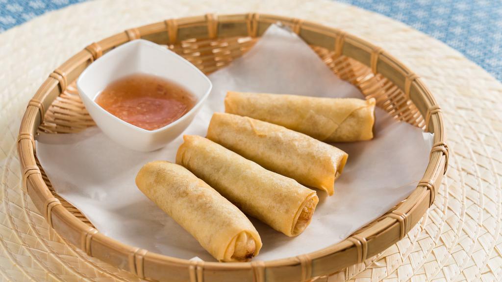 Spring Rolls · Cabbage, carrot, and glass noodle. Served with sweet chili sauce. VG