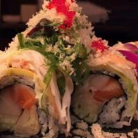 Ginger Roll · Salmon, white tuna, cucumber and ginger inside. Avocado, crab meat, seaweed salad on top in ...