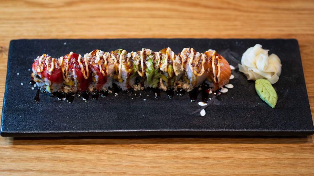 Ozakaya Rolls (Spicy Roll) · Eel, mango, topped with tuna, salmon, avocado, eel sauce and spicy mayo.