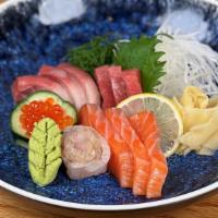 Sashimi Plate · Raw sliced of salmon, tuna, yellowtail, white fish, ikura. Add Uni for an additional charge.