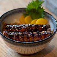 Unagi Don · Grilled whole eel, eel sauce and Pickle.