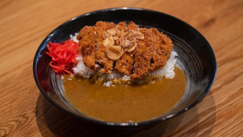 Tonkatsu Curry · Breaded fried pork with Homemade curry, served with white rice, fried onion, scallion and Beni Shoga.