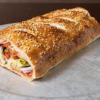 Stromboli · Stuffed with sausage, mozzarella, and peppers.