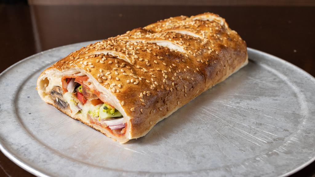 Stromboli · Stuffed with sausage, mozzarella, and peppers.