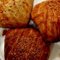 Tandir Baked Samsa · Meat 500 gr, puff-pastry 500 gr, onions 500 gr, spices.