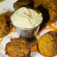 Falafel (5 Pcs.) · Chickpeas blended with special herbs & seasonings.