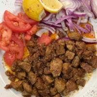 Beef Liver · Sautéed beef liver & special seasoning served with onions, tomatoes & lemon.
