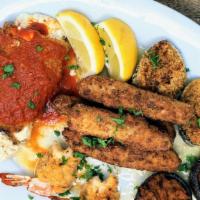 Hot Antipasto · eggplant rollatini,stuffed pepper ,stuffed mushrooms,baked clams and fried shrimp 2 of each
