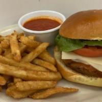 Veggie Burger · Veggie Burger, Goat Cheese, Field Greens and Tomato